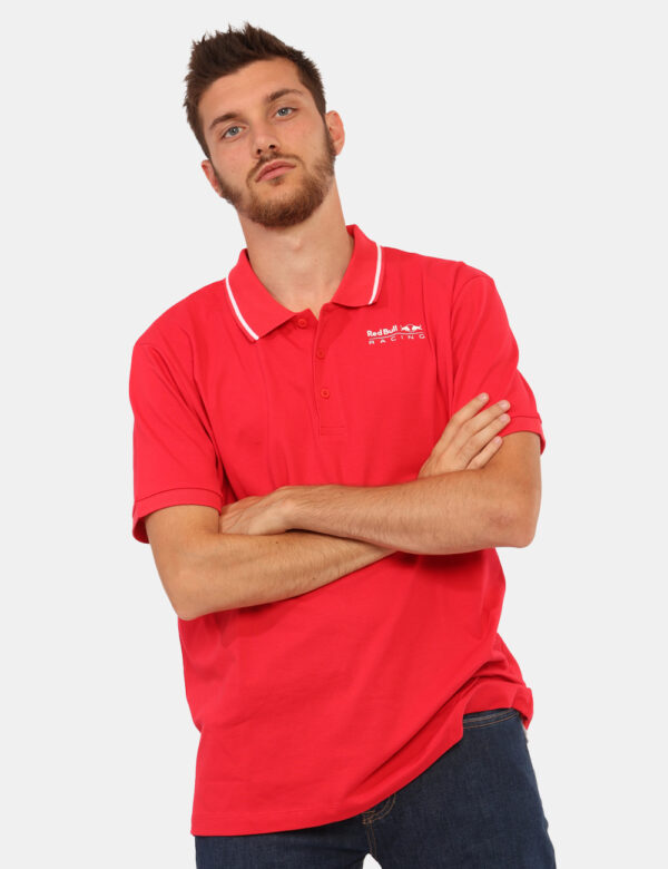 Polo Red Bull Rosso - Polo classica in total blu navy con logo bianco che richiama il profilo del colletto. La vestibilità è