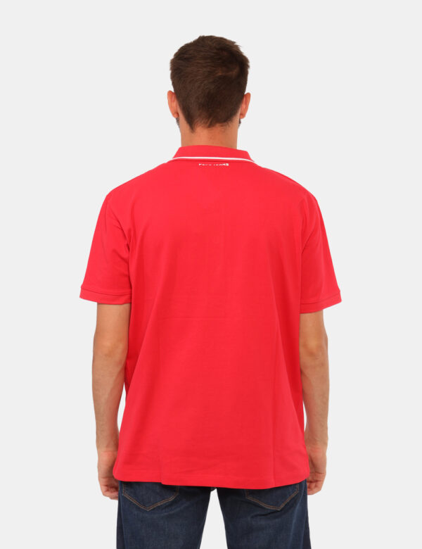 Polo Red Bull Rosso - Polo classica in total blu navy con logo bianco che richiama il profilo del colletto. La vestibilità è