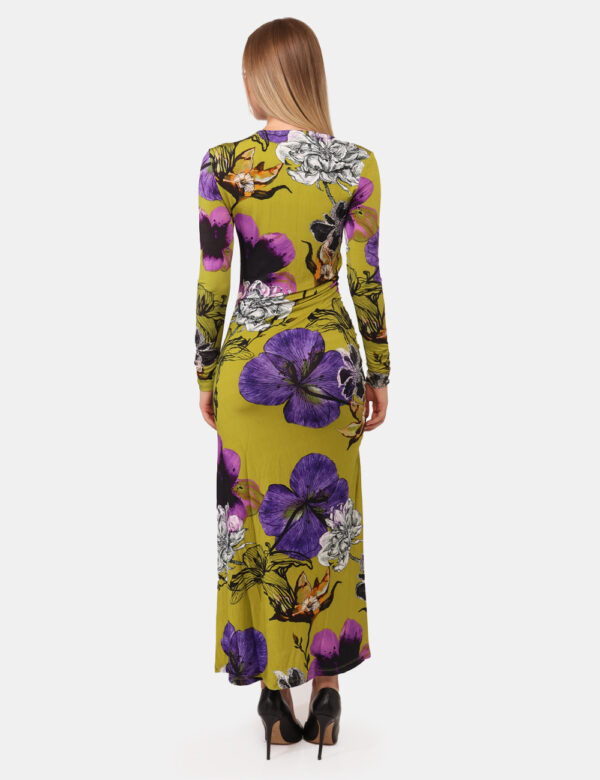 Vestito Desigual Verde - Vestito lungo con maniche lunghe, scollo irregolare, su base verde con stampa floreale viola. La ve