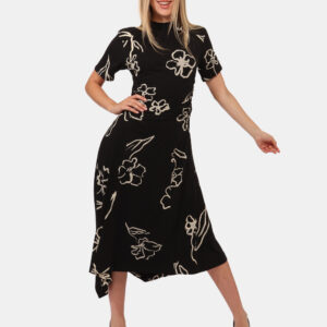 Vestito Desigual Nero - Vestito lungo a maniche corte, su base nera con stampa floreale beige. La vestibilità è morbida e re