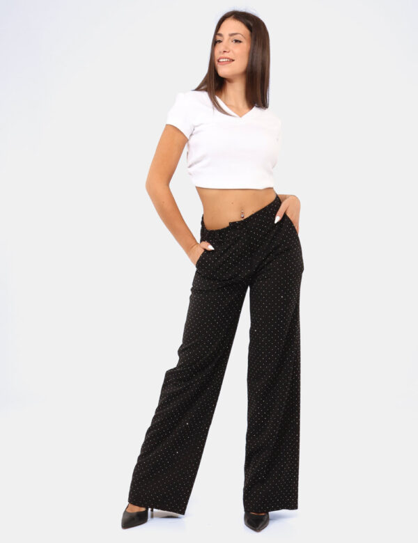Pantaloni Rue De Clerie Nero - Pantaloni larghi su base nera con glitter allover argentati. Presenti tasche a taglio trasver