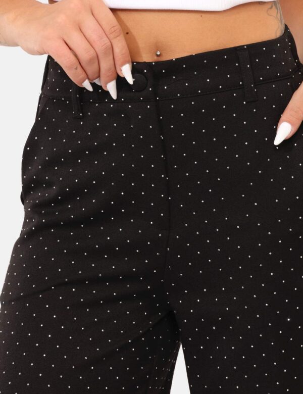 Pantaloni Rue De Clerie Nero - Pantaloni larghi su base nera con glitter allover argentati. Presenti tasche a taglio trasver