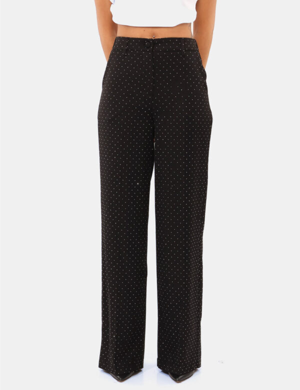 Pantaloni Rue De Clerie Nero - Pantaloni larghi su base nera con glitter allover argentati. Presenti tasche a taglio trasver