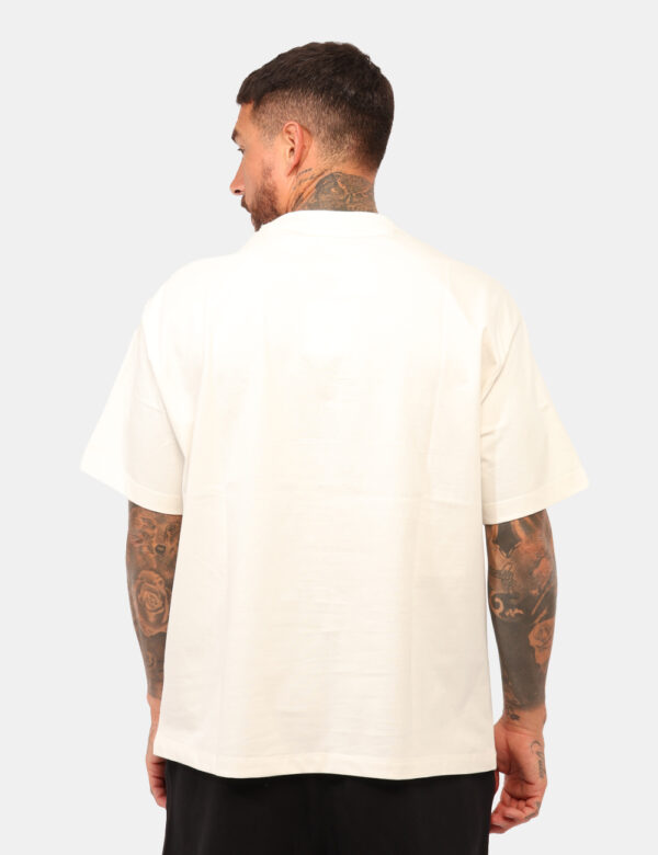T-shirt Calvin Klein Bianco - T-shirt classica in cotone spesso, total bianco con ricamo logo brand rosso. La vestibilità è