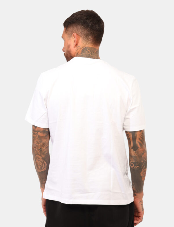 T-shirt Calvin Klein Bianco - T-shirt classica in total bianco con stampa in rilievo grigia. La vestibilità è morbida e rego