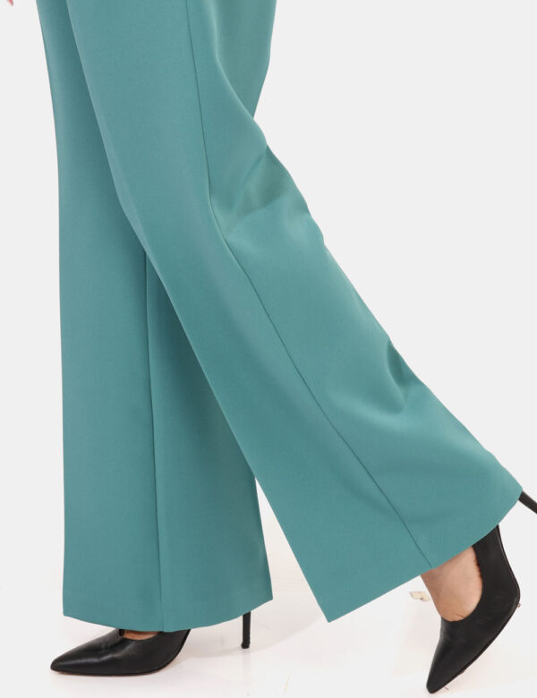 Pantaloni Materica Verde - Pantaloni palazzo eleganti, in total verde tiffany, con tasche a taglio trasversale sul fronte. L