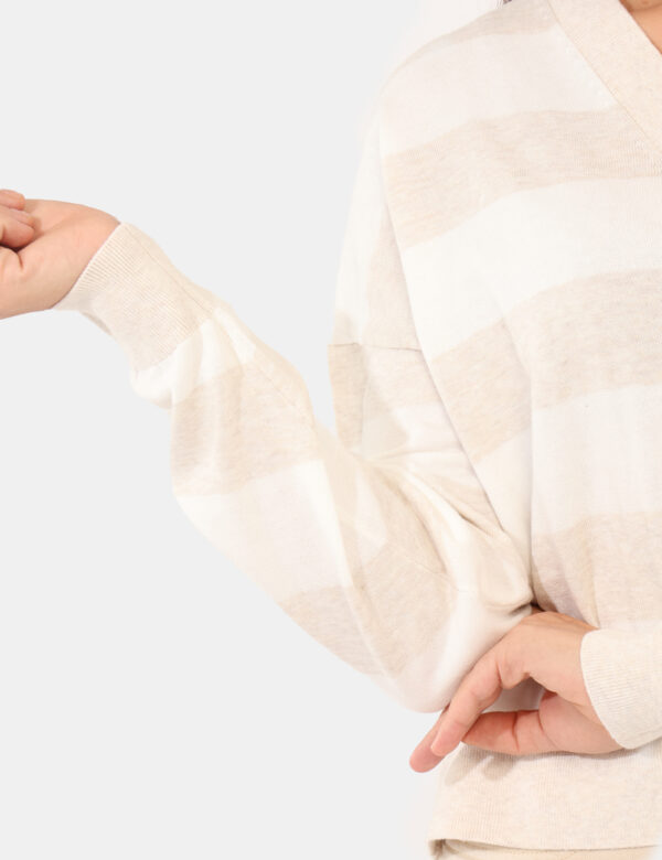 Cardigan Tommy Hilfiger Beige - Cardigan a righe panna e beige, con logo del brand ricamato.Cod. art. DW0DW20968 OAVi ricord