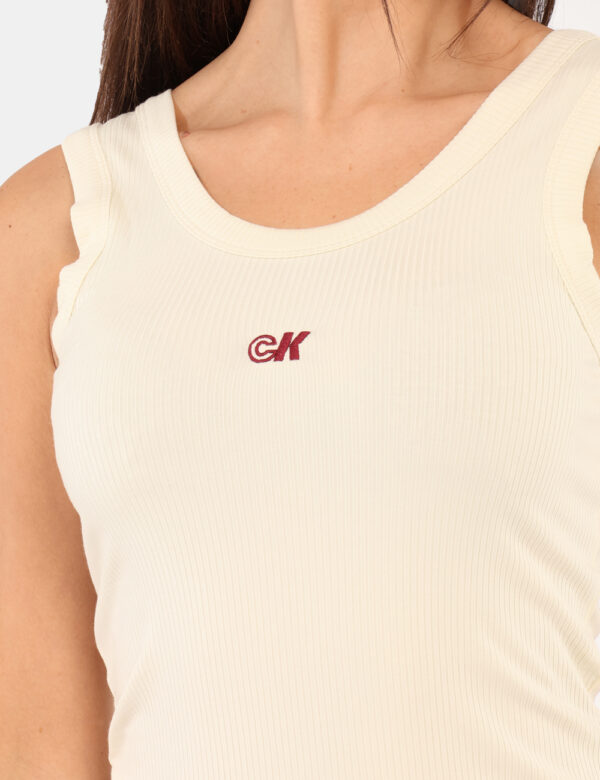 Top Calvin Klein Bianco - Top senza maniche, in total panna con logo brand ricamato bordeaux. La vestibilità è morbida e re