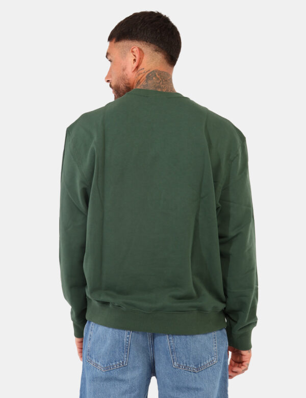 Felpa Calvin Klein Verde - Felpa classica, garzata, in total verde con girocollo e polsini. La vestibilità è morbida e regol