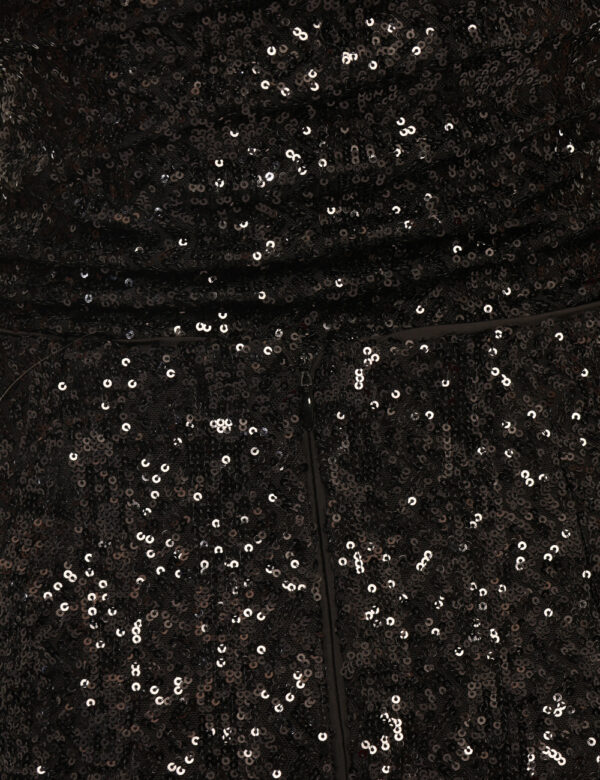 Gonna Guess Nero - Gonna corta ricoperta di paillettes in total nero. La vestibilità è morbida e pratica grazie a zip sul re