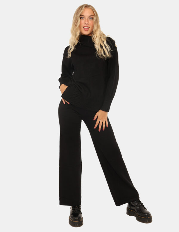 Pantaloni Rue De Clerie Nero - Pantaloni in maglina, larghi, in total nero. La vestibilità è morbida e regolabile grazie ad