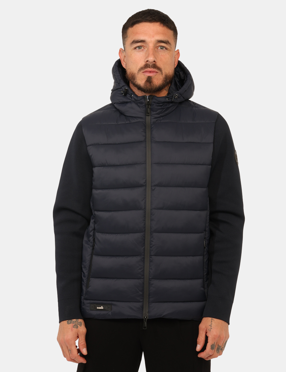 CANKA25-OA_BLU_AI25_8 Piumino Braddock Blu - Piumino con cappuccio in total blu e maniche in tessuto, più tasche a taglio trasversale. La vestibil