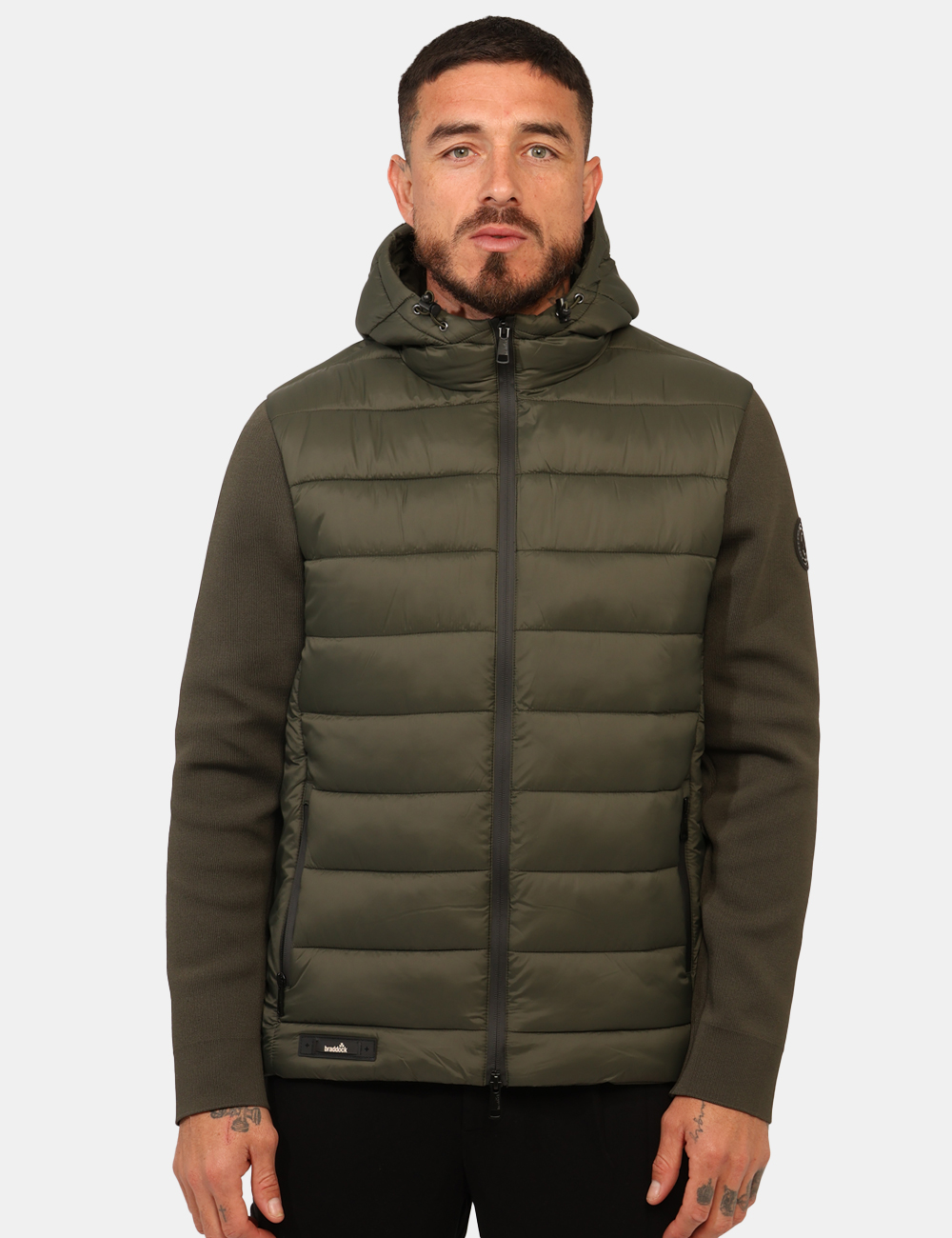 CANKA25-OA_VERDE_AI25_8 Piumino Braddock Verde - Piumino con cappuccio in total verde e maniche in tessuto, più tasche a taglio trasversale. La vest