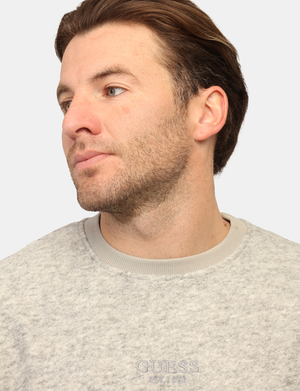 M5BQ07-KC380-SB_LIGHT-STONE-HEATHER_PE26_5 Felpa Guess Grigia - Felpa GUESS Grigia da uomo La Felpa GUESS Grigia è il capo ideale per affrontare la stagione con uno st