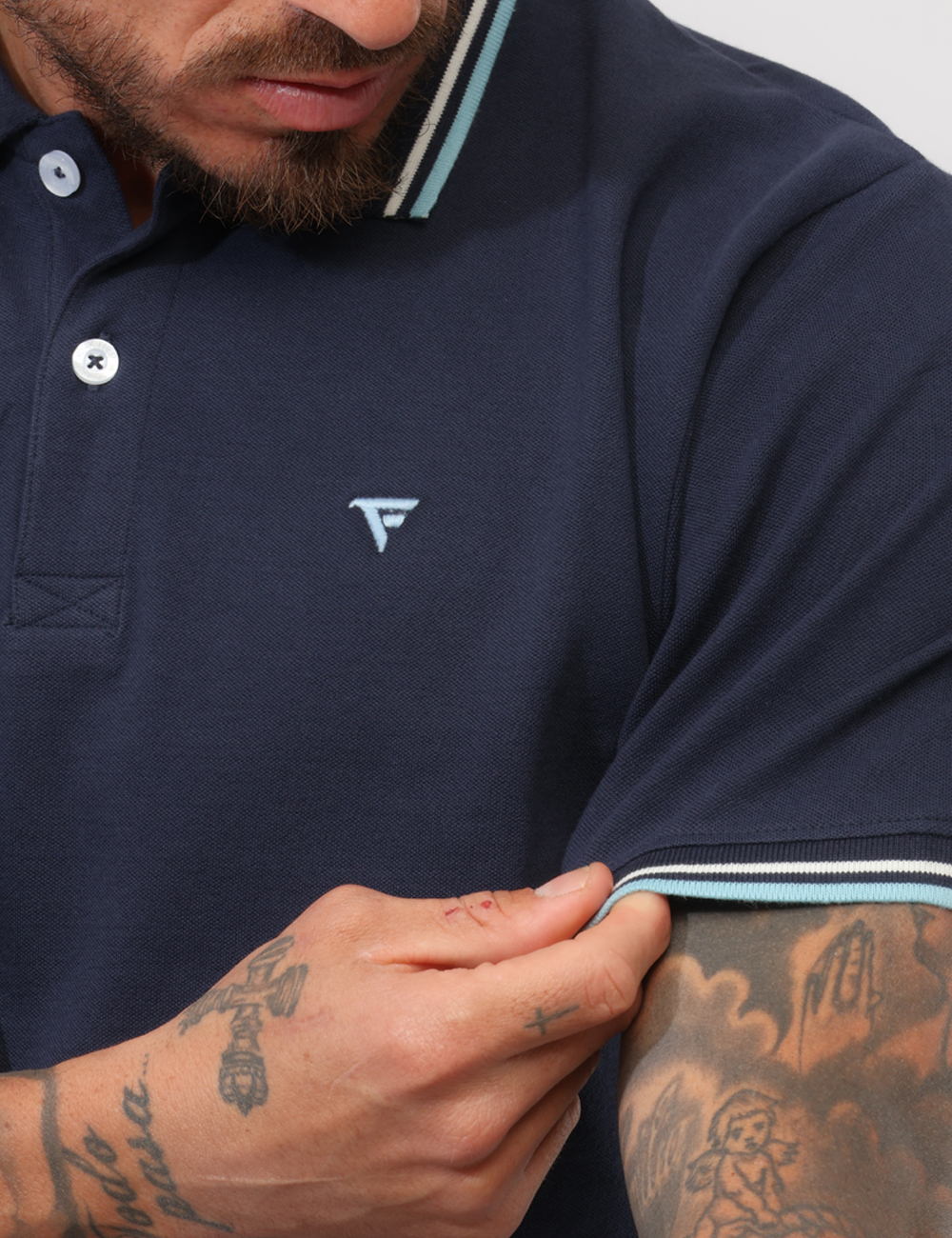 FM26S07QU-SB_BLUE_PE26_4 Polo Fred Mello Blu - Polo FRED MELLO Blu da uomo La Polo FRED MELLO Blu è il capo perfetto per chi desidera uno stile versa