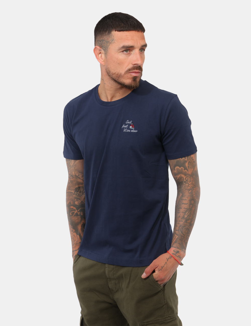 FM26S15TG-SB_BLUE_PE26_1 T-shirt Fred Mello Blu - T-shirt FRED MELLO Blu da uomo La T-shirt FRED MELLO Blu è il capo perfetto per chi cerca uno stile