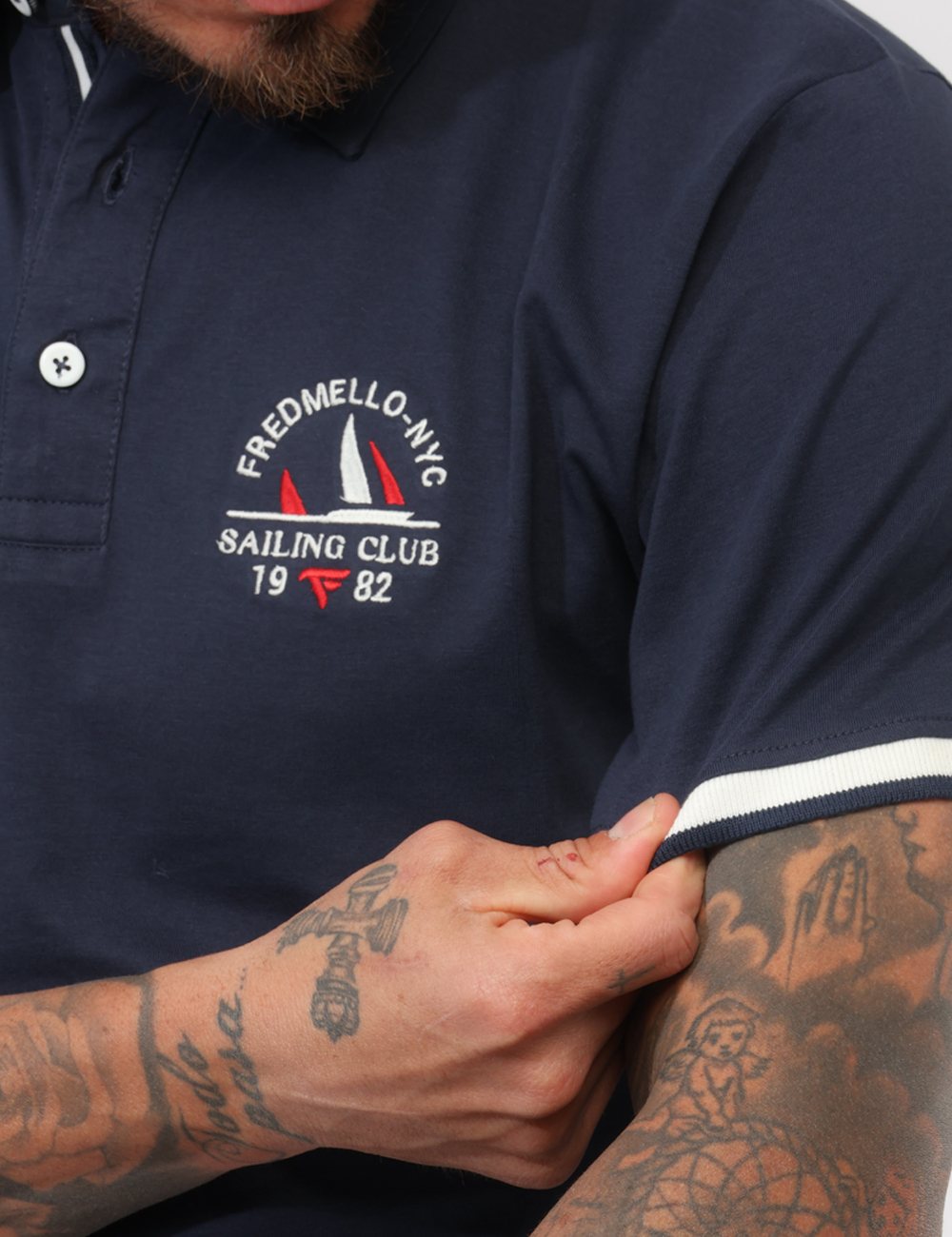 FM26S18QC-SB_BLUE_PE26_3 Polo Fred Mello Blu - Polo FRED MELLO Blu da uomo La Polo FRED MELLO Blu è il capo ideale per chi desidera un look curato ma