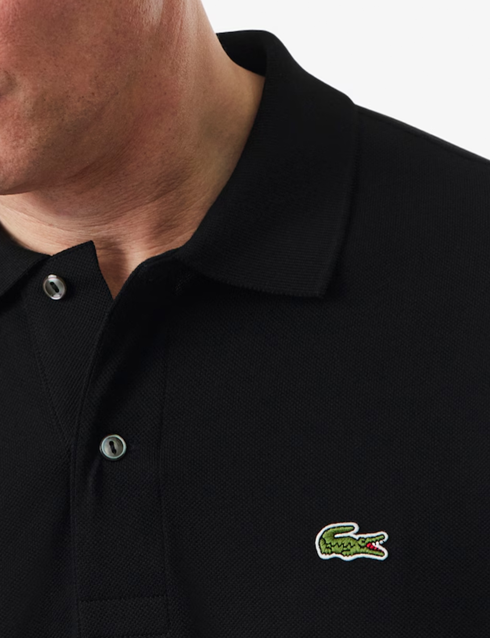 2645193-COLIS-SB_BLACK_PE26_3 Polo Lacoste Nera - Polo LACOSTE Nera da uomo Iconica, versatile e sempre attuale, la Polo LACOSTE Nera è un capo essenziale