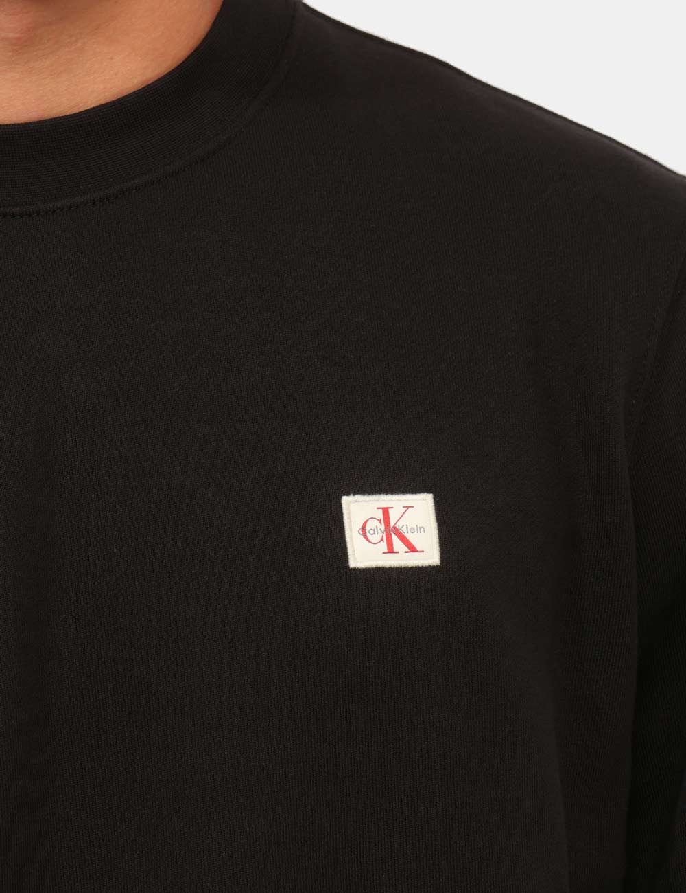 LV04RG268G_UB1_AI26_4 Felpa Calvin Klein Nera - Felpa CALVIN KLEIN Nera da uomo: essenzialità e comfort per la mezza stagione La Felpa CALVIN KLEI