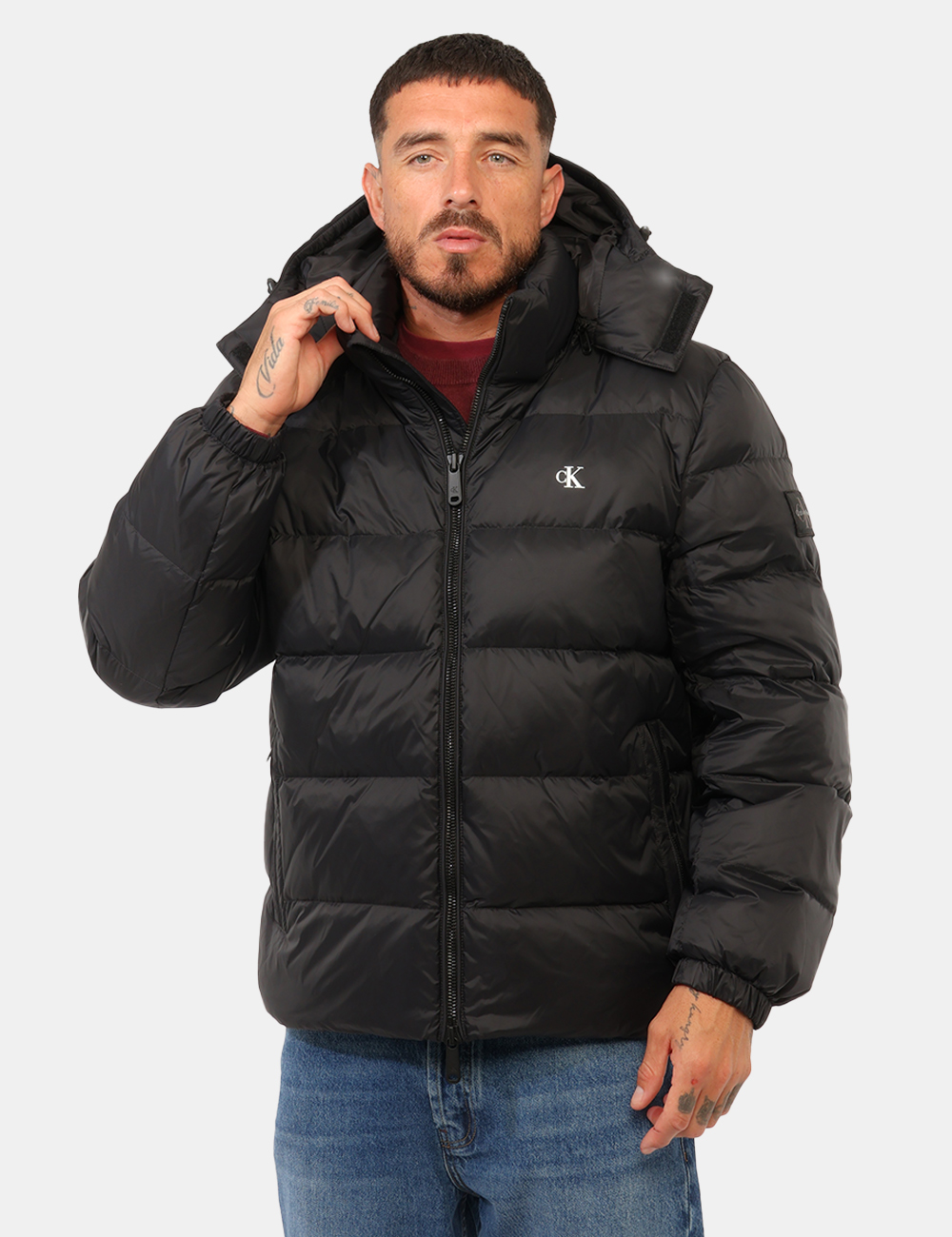 LV04RG515G_UB1_AI26_1 Piumino Calvin Klein Nero - Piumino CALVIN KLEIN Nero da uomo Il Piumino CALVIN KLEIN Nero da uomo è un capo versatile e con