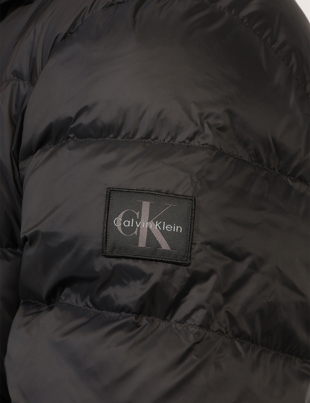LV04RG515G_UB1_AI26_3 Piumino Calvin Klein Nero - Piumino CALVIN KLEIN Nero da uomo Il Piumino CALVIN KLEIN Nero da uomo è un capo versatile e con