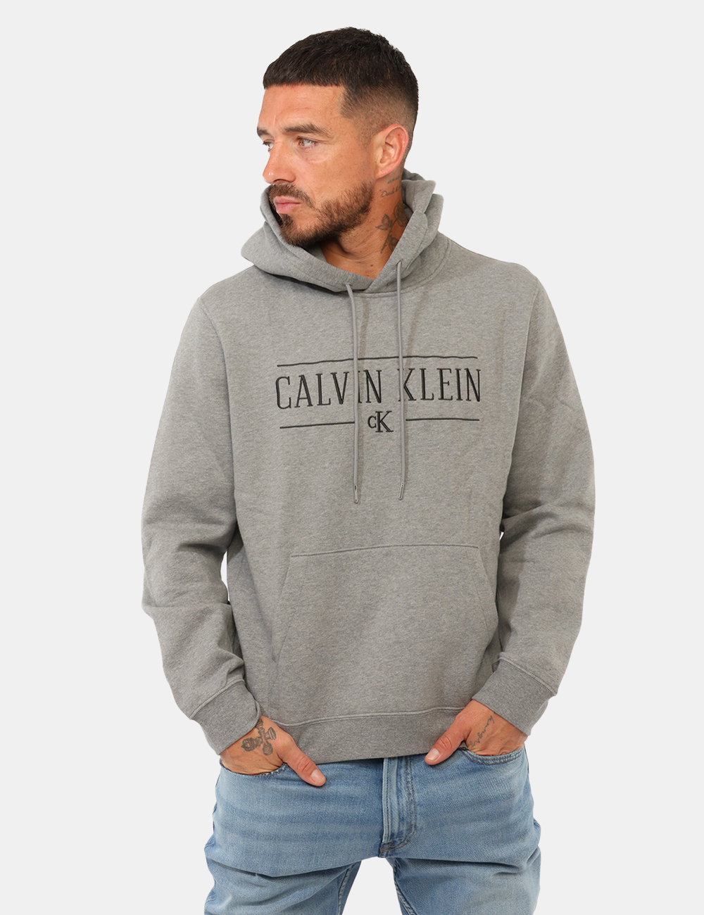 Felpa Calvin Klein Grigia - Felpa Calvin Klein Grigia da UomoLa felpa Calvin Klein grigia da uomo è un capo essenziale e ver