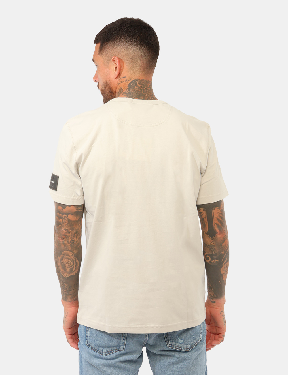 T-shirt Calvin Klein Grigia - T-shirt Calvin Klein Grigio chiaro da UomoLa T-shirt Calvin Klein da uomo è un capo versatile